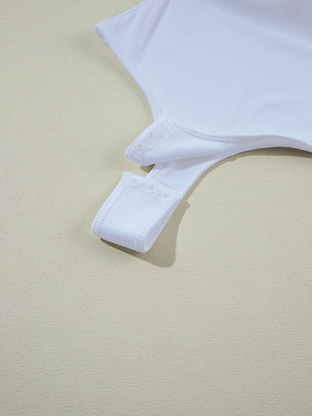 White Ribbed Knit Sleeveless Bodysuit with Square Neck